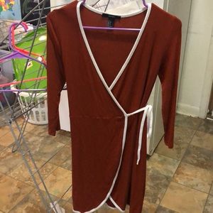 Burnt orange wrap dress . Size small very cute